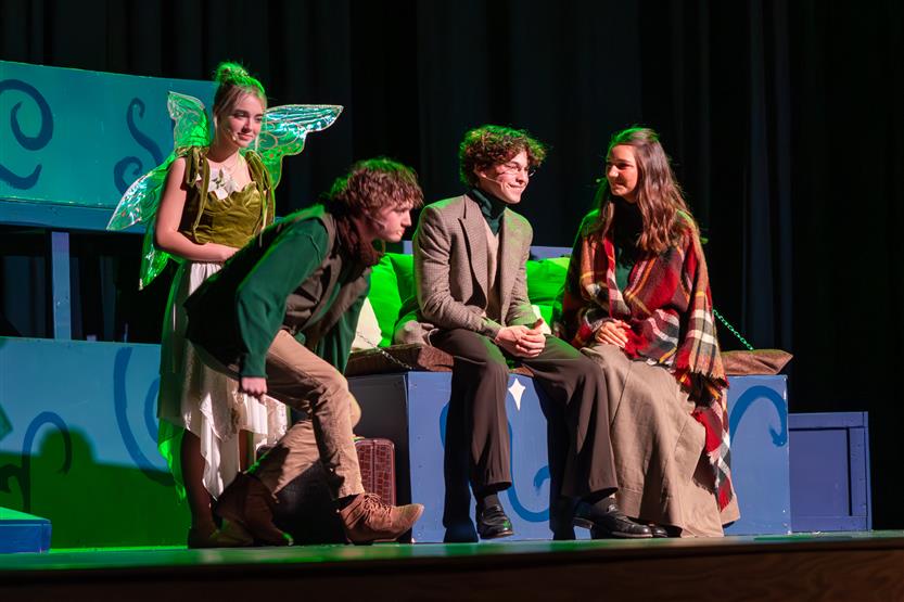 Students perform onstage